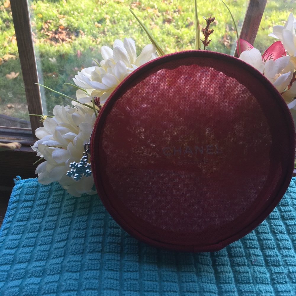 Authentic CHANEL Circular Makeup Bag